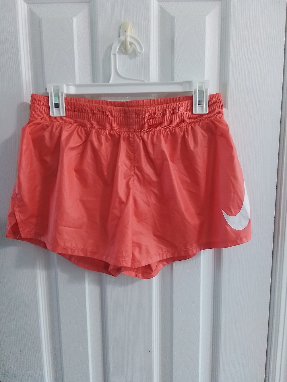 Nike Coral Athletic Running Shorts with White Swoosh